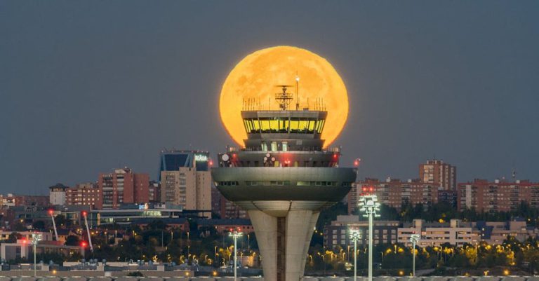 Self-Control - Full Moon behind Air Traffic Control at Madrid Airport