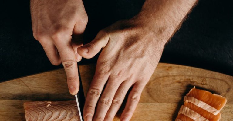 Methods - Person Holding Silver Bread Knife