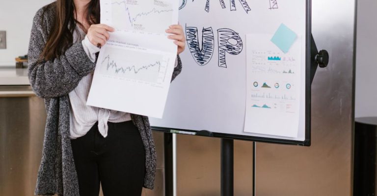 Mindset - Woman in Gray Coat Holding White Printer Paper