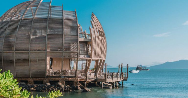 Retreats - A wooden building with a large dome on top of it